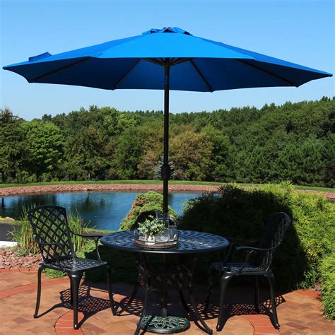 9-foot round auto-tilt aluminum market umbrella in sunbrella fabric|10 foot Sunbrella market umbrella.